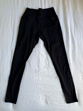 American Giant Black Athletic Leggings with Subtle Red Logo Accent